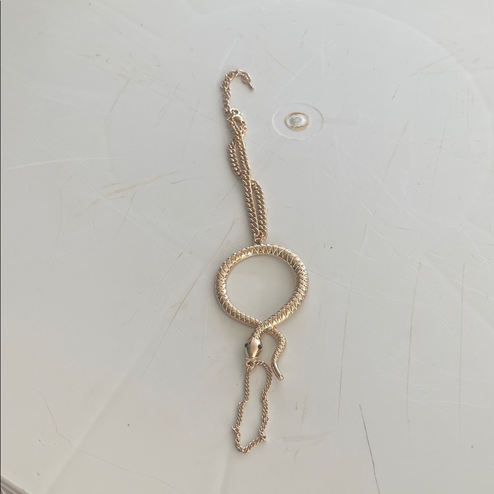 Gold Serpentine Loop hand piece  - Elegant Gold-Tone Pendant